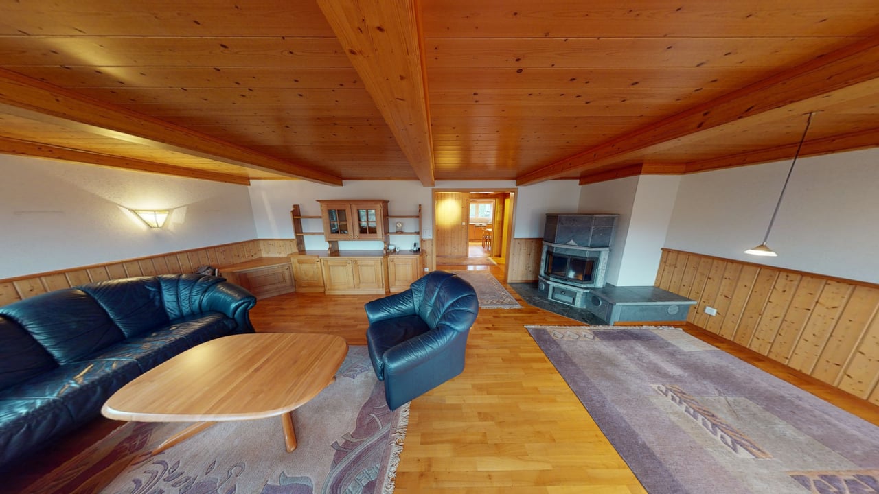 3D-Rundgang eines Wohnraums mit Cheminée